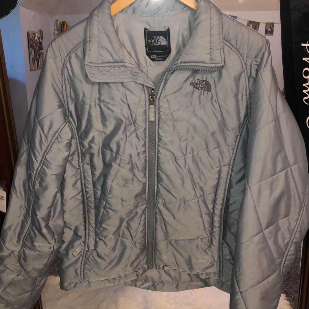 Blue North Face light winter jacket.